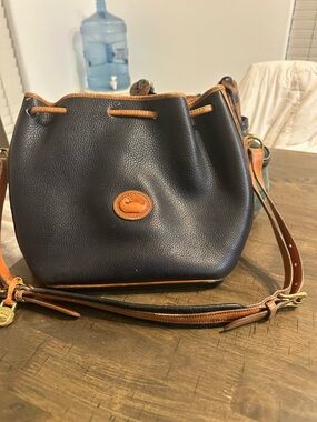 Dooney & Bourke Black Pebble Leather Drawstring Crossbody with Tan Trim